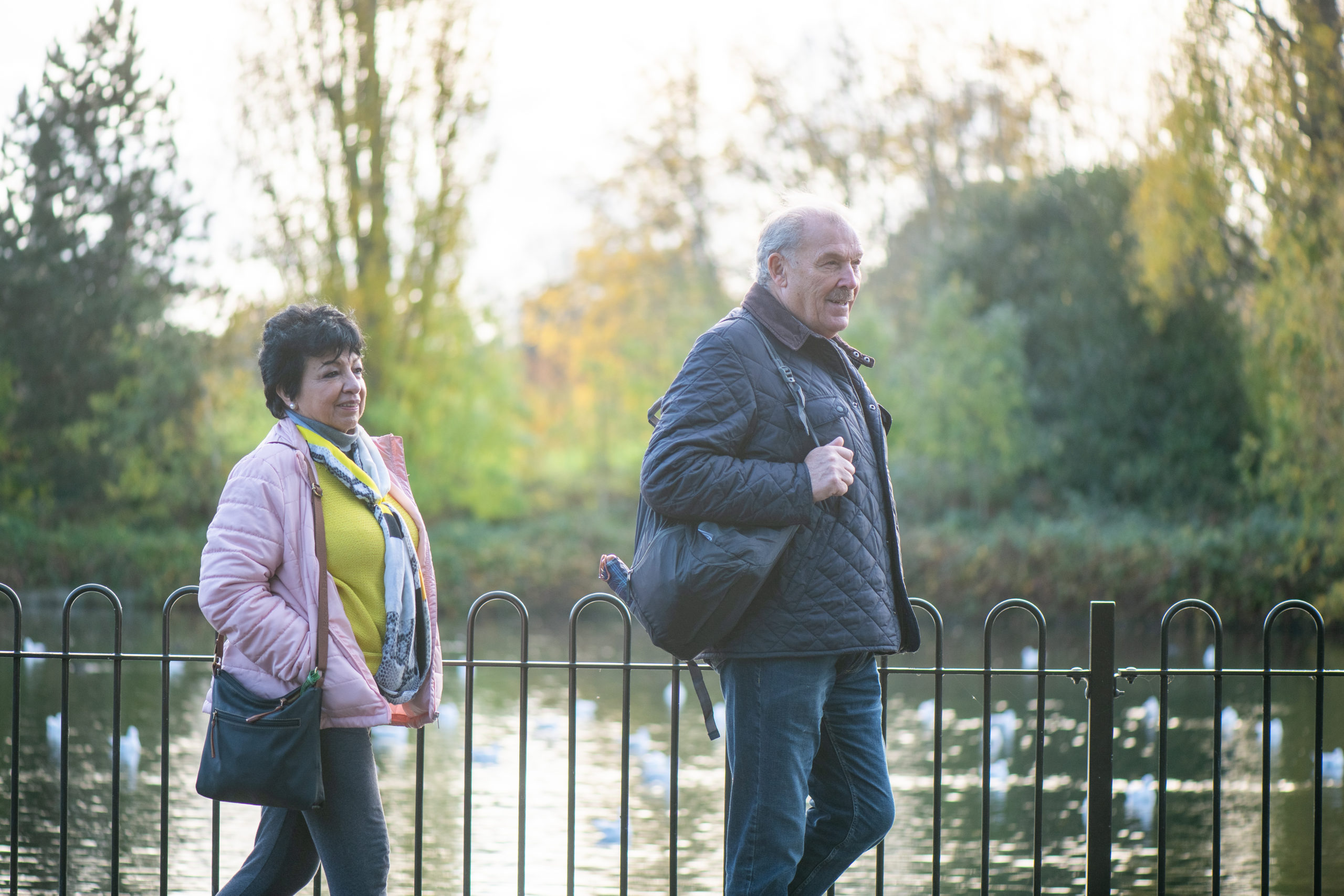 Image of couple walking in the park